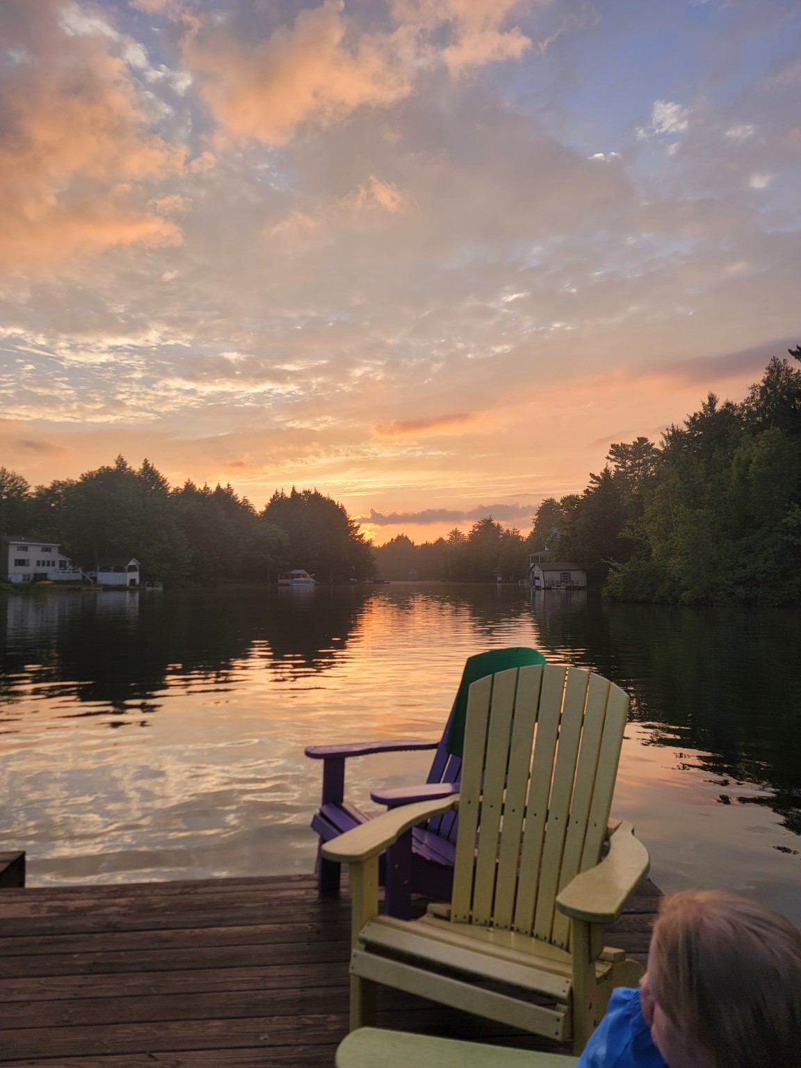 Adirondack chairs at sunset